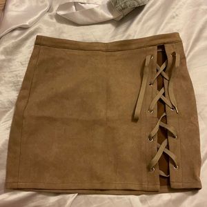 Camel suede mini skirt.